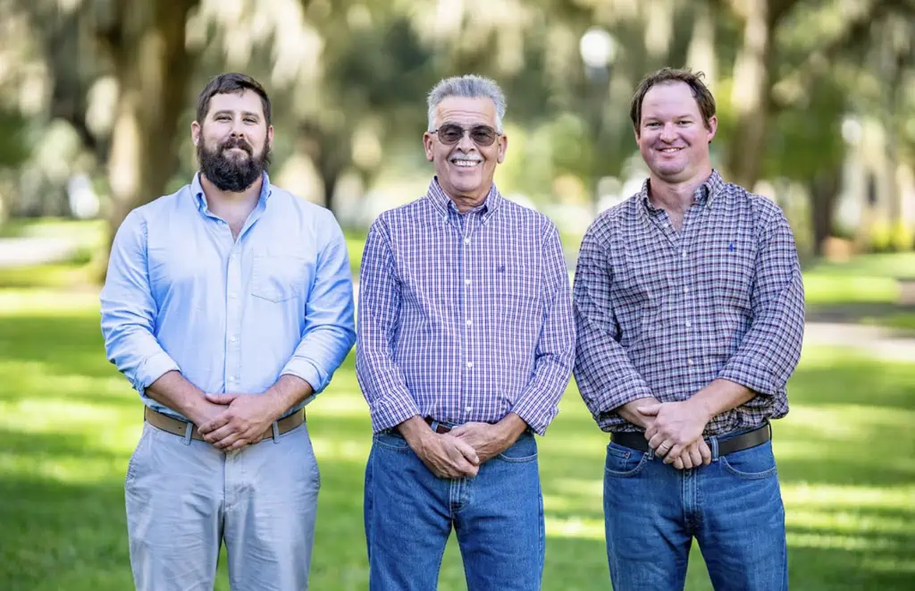  Tony Greco and Graham Jones, current co-owners of Leisure Pools Savannah, together with their father-in-law Jerry Sutcliffe.