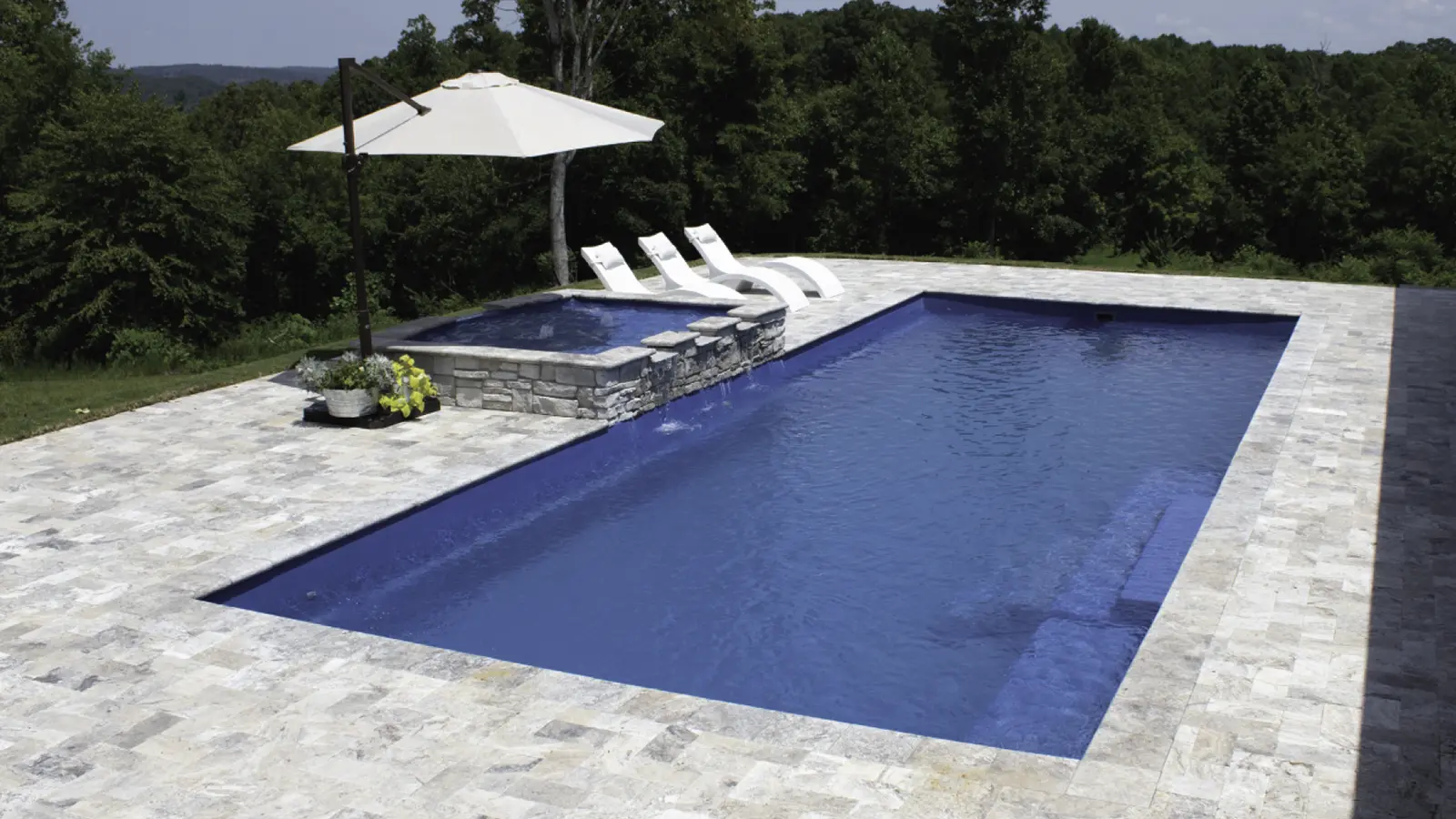 Leisure-Pools-Pinnacle-Fiberglass-Pool-Model-Hero The Grand™, a fiberglass pool design manufactured by Leisure Pools